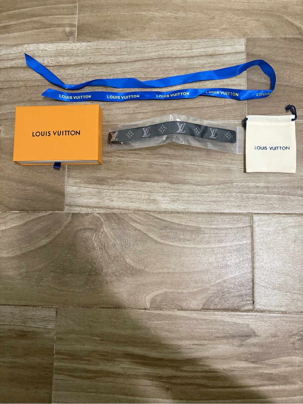 Louis Vuitton Monogram Leather Bracelet in Gray with Silver Motifs